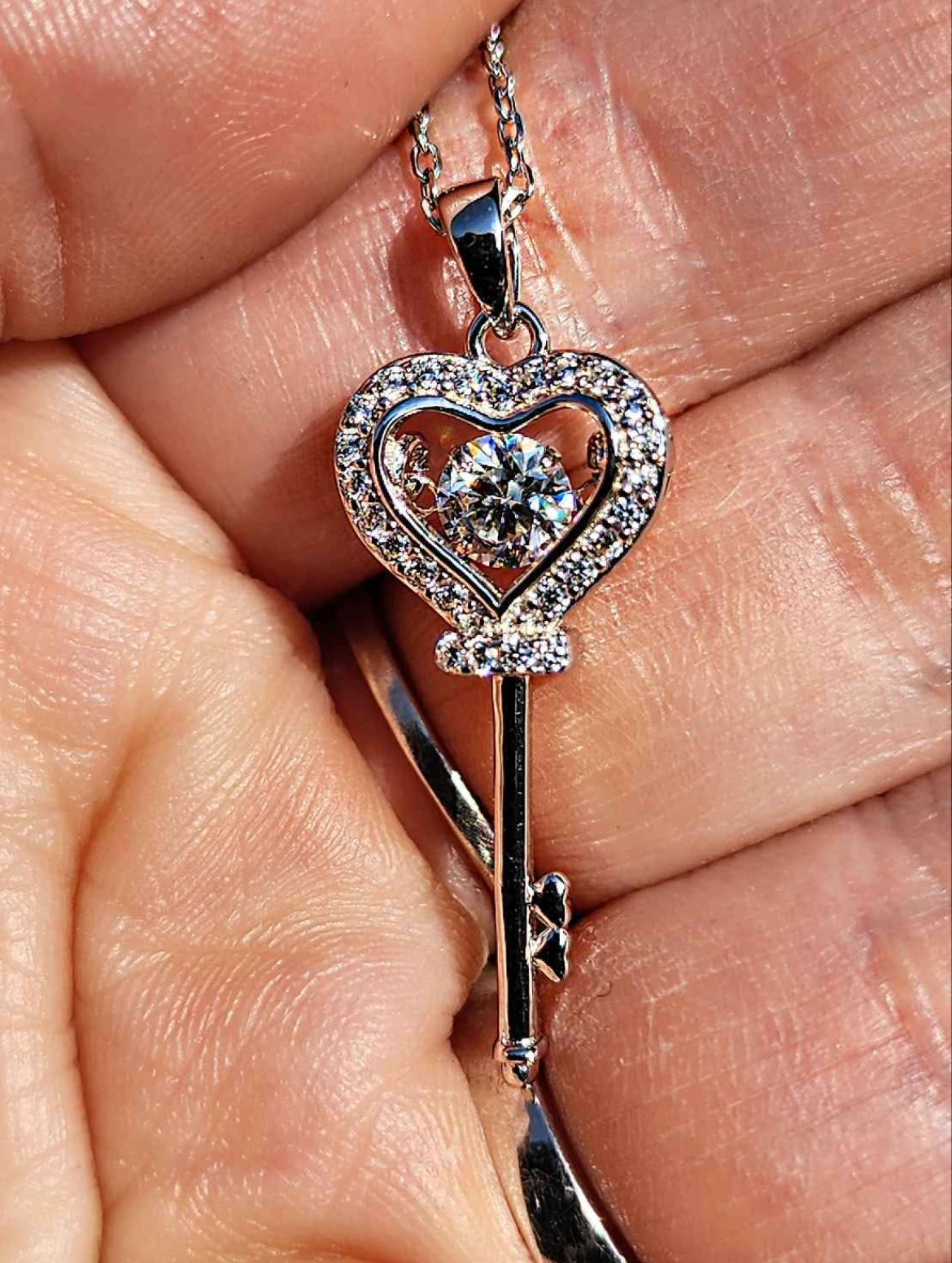 0.5 Carat Moissanite 18kt white gold plated Sterling Silver Key Necklace