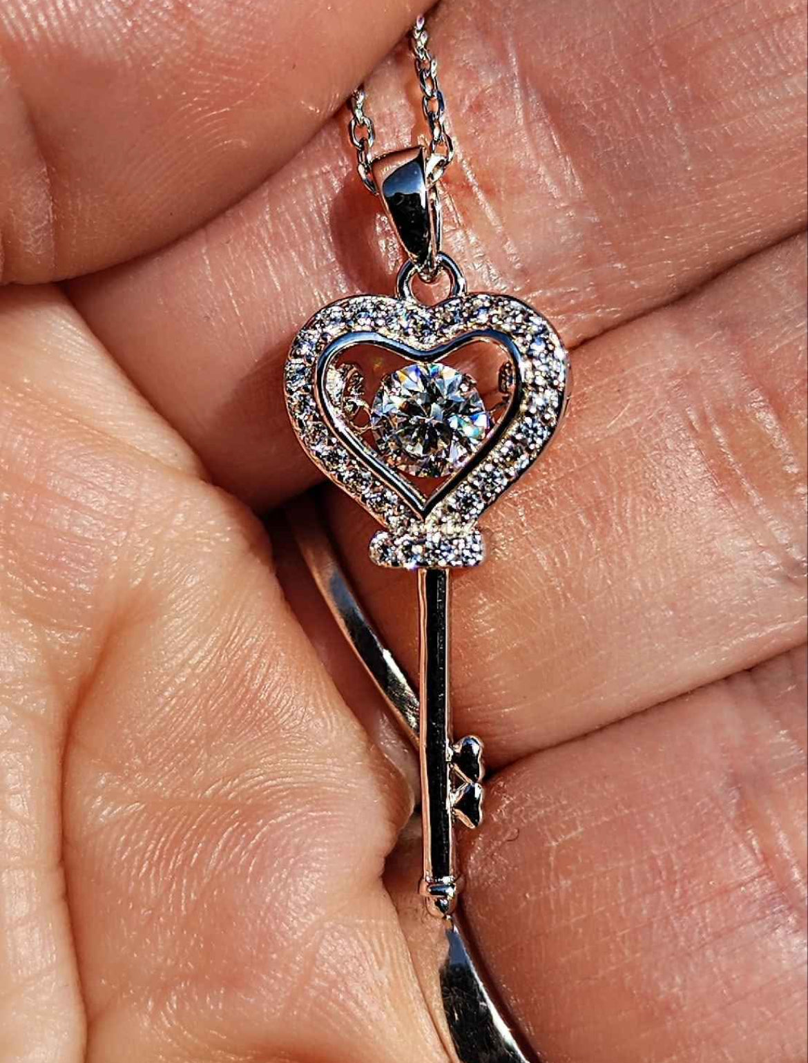 0.5 Carat Moissanite 18kt white gold plated Sterling Silver Key Necklace