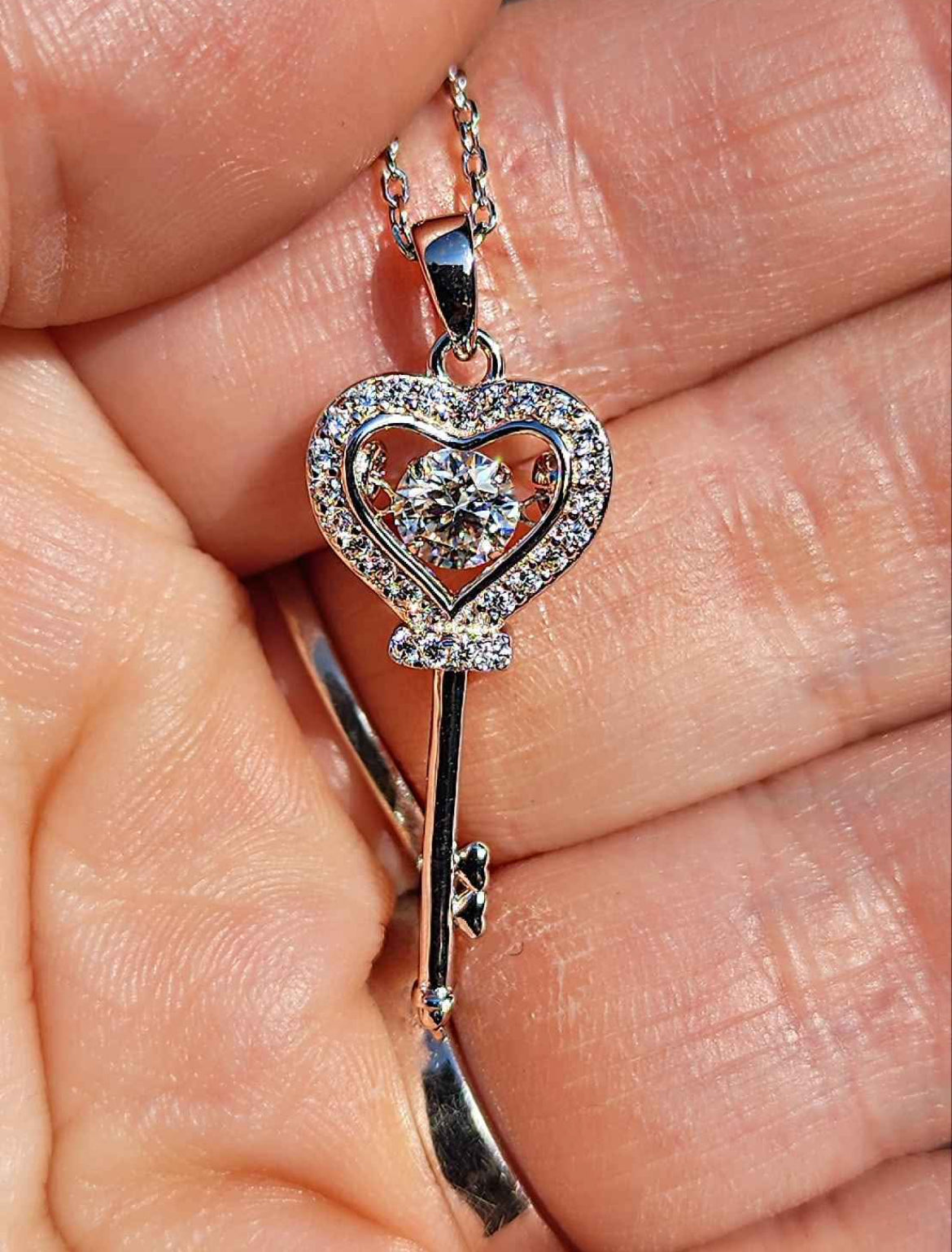 0.5 Carat Moissanite 18kt white gold plated Sterling Silver Key Necklace