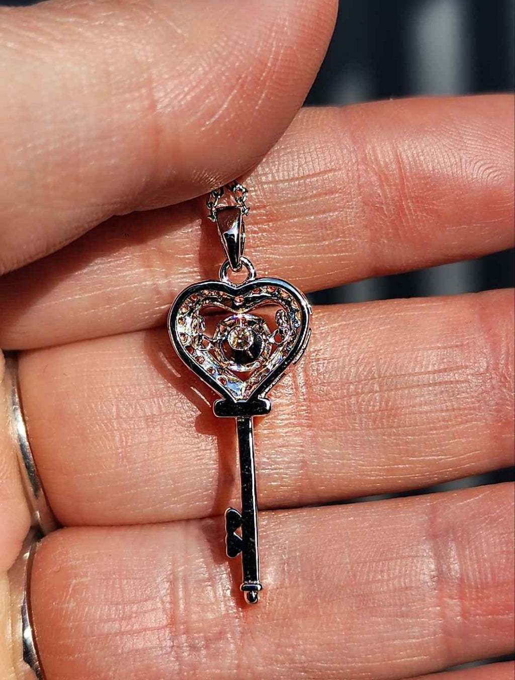 0.5 Carat Moissanite 18kt white gold plated Sterling Silver Key Necklace