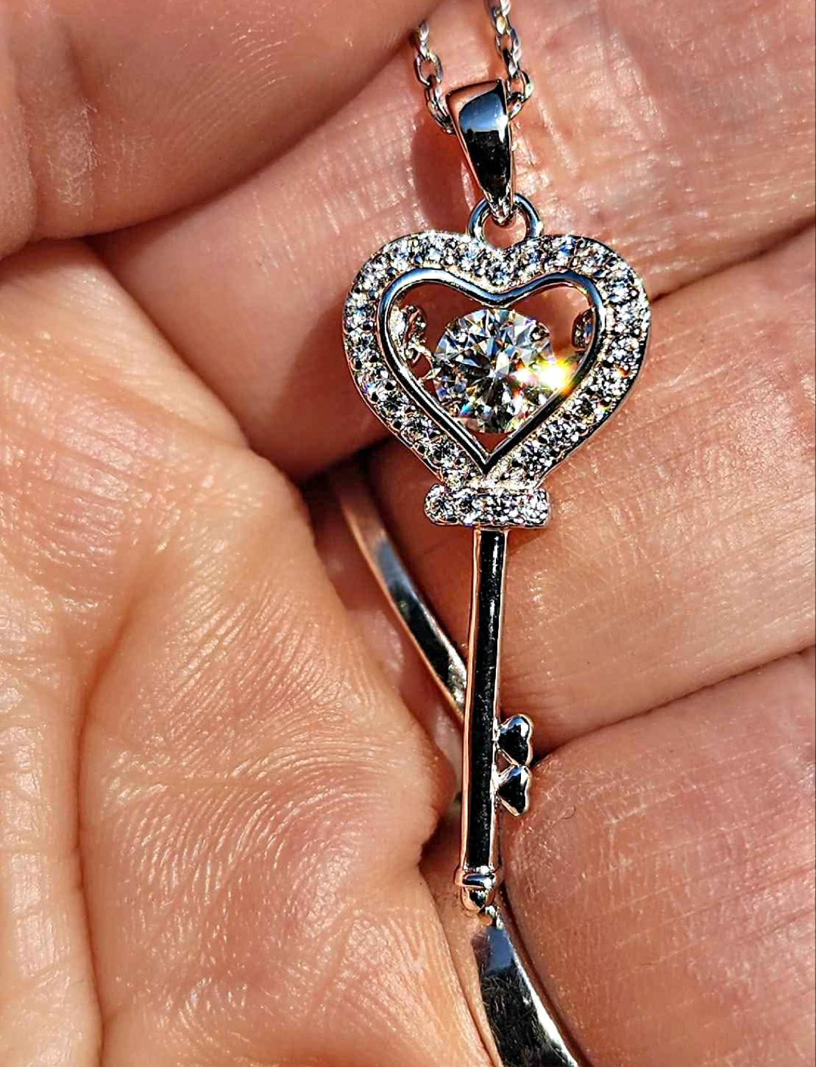 0.5 Carat Moissanite 18kt white gold plated Sterling Silver Key Necklace